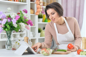 woman cooking learning food integration for recovery