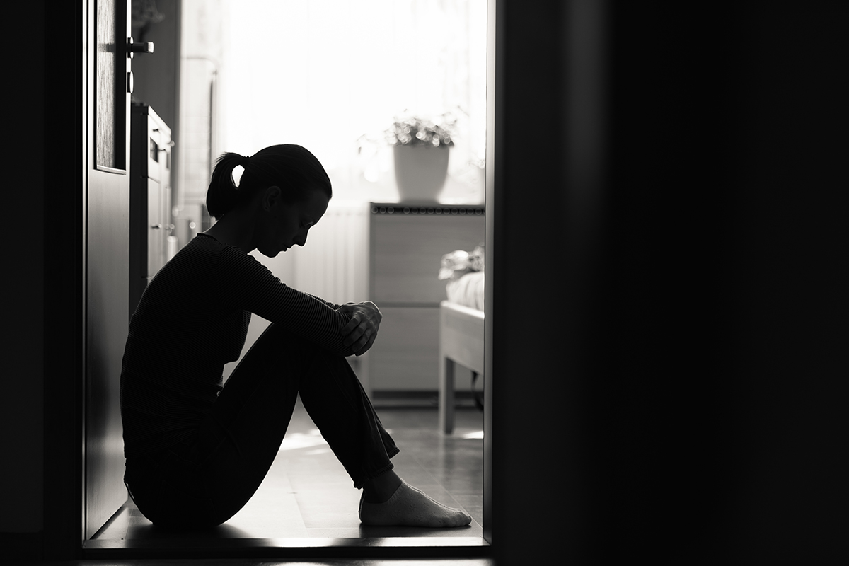 silhouette of woman dealing with childhood trauma and addiction