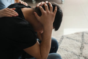 man struggling with his mental health needing to participate in suicide prevention day
