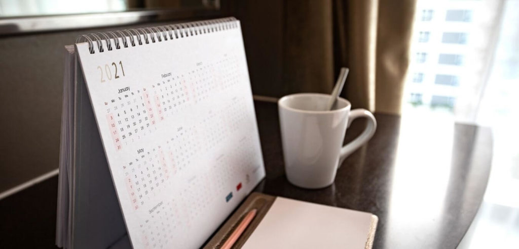 2021 calendar with coffee cup and pencil