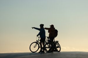 man riding bicycle on beach during sunset, conversation About Residential Alcohol Rehab and what to expect