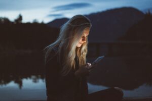 woman struggling with a phone sex addiction