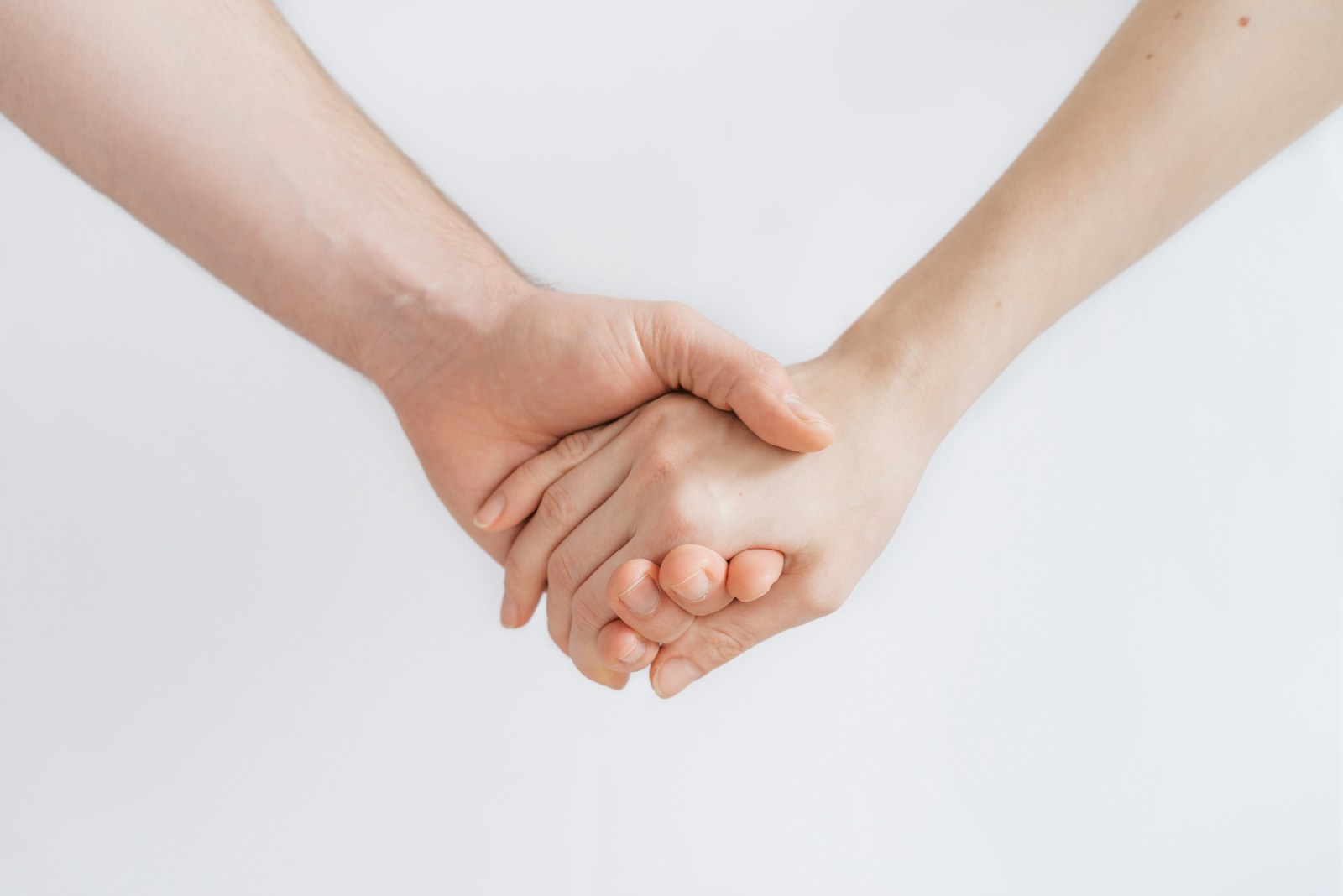 woman and man holding hands, codependency treatment
