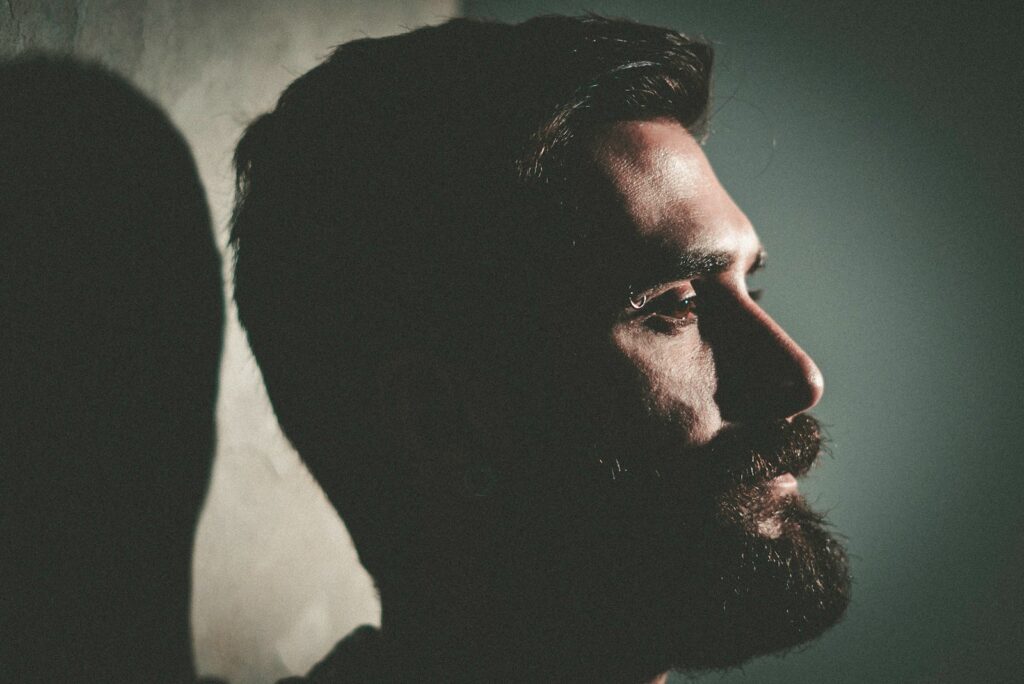 closeup photo of man with beard, men's substance abuse treatment