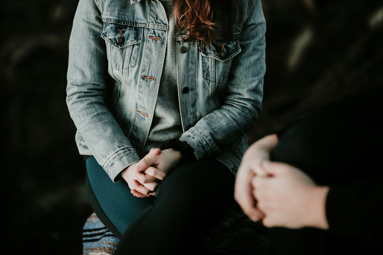 woman wearing gray jacket, trauma informed therapist