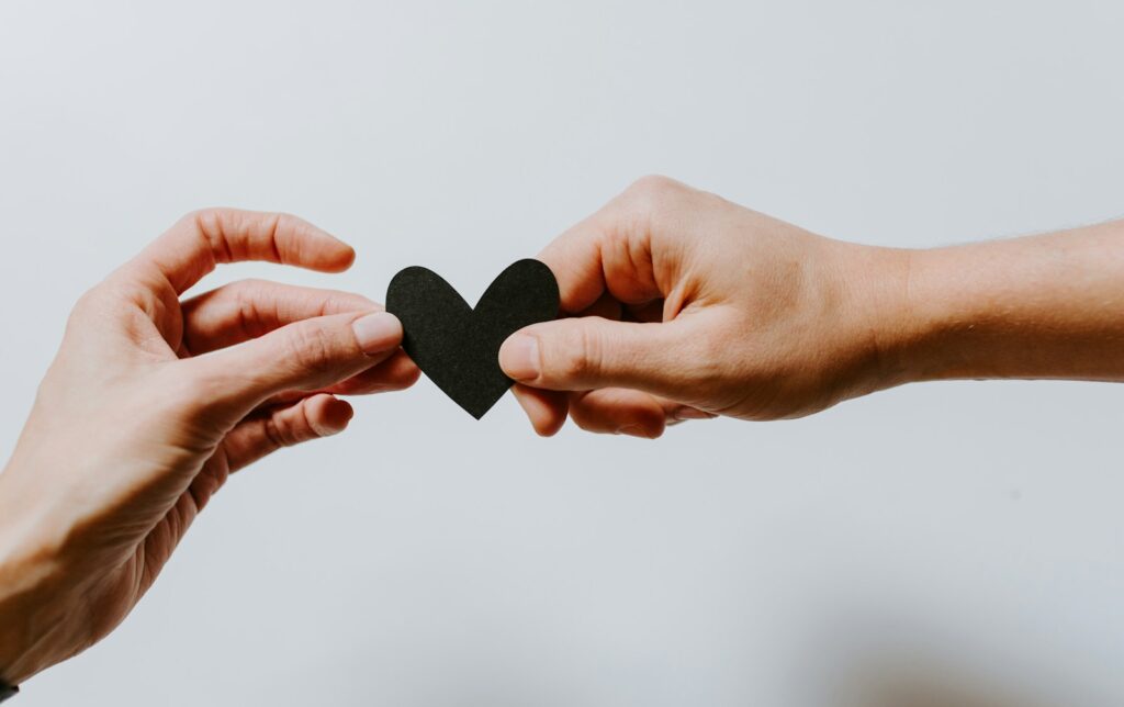 two person holding papercut heart, dual diagnosis rehabilitation centers