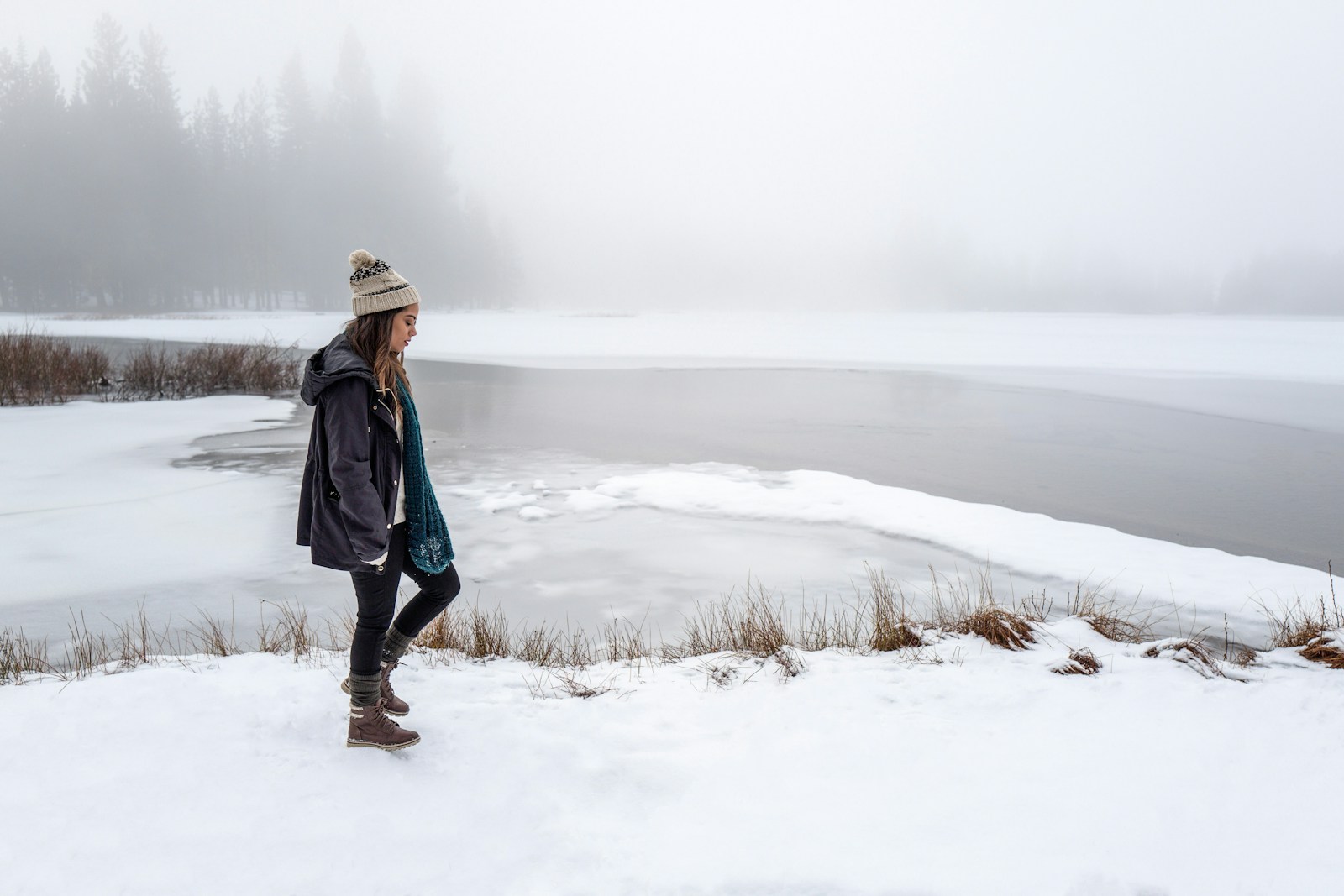 woman wearing black jacket walking on snow struggling with female porn addiction