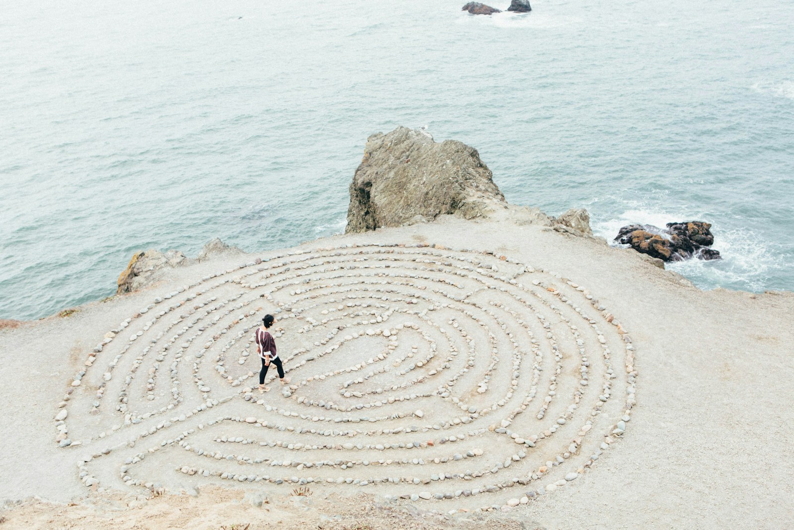 person walking on beach during daytime pursuing porn addiction recovery