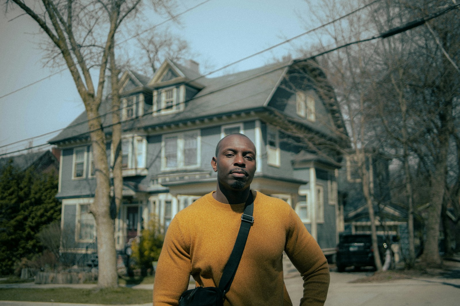 man in yellow crew neck long sleeve shirt standing near building knowing how to stop masturbation addiction