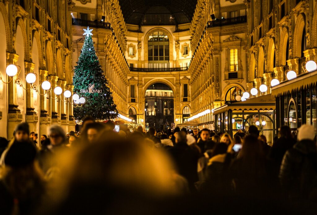 man and woman passing on cathedral, embodying holiday stress
