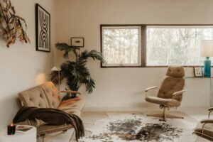 Optum drug rehab room with vintage furniture and plants