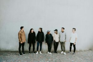 Addiction support groups standing near wall
